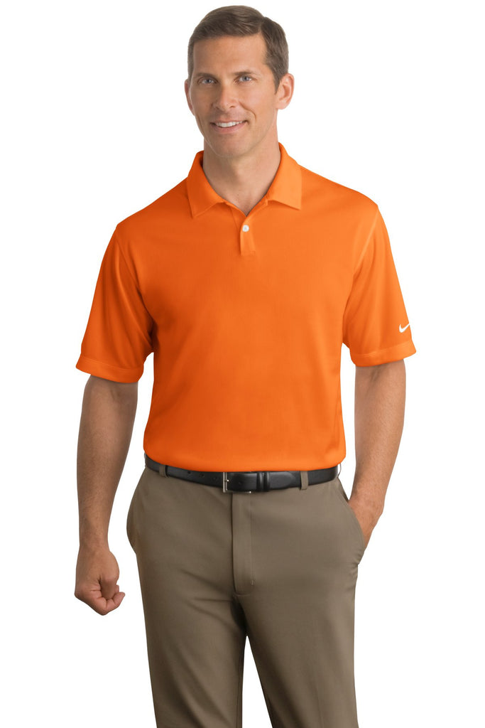 Orange nike golf 2024 polo